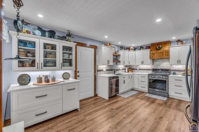More than a townhome!... A smart, low-maintenance lifestyle near on Lake Shawnee Golf Course in Kansas - for sale on GolfHomes.com, golf home, golf lot
