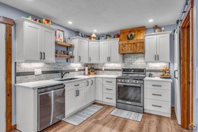 More than a townhome!... A smart, low-maintenance lifestyle near on Lake Shawnee Golf Course in Kansas - for sale on GolfHomes.com, golf home, golf lot