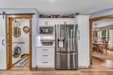 More than a townhome!... A smart, low-maintenance lifestyle near on Lake Shawnee Golf Course in Kansas - for sale on GolfHomes.com, golf home, golf lot
