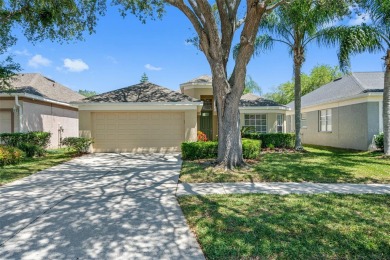 Under contract-accepting backup offers. Charming four-bedroom on TPC of Tampa Bay in Florida - for sale on GolfHomes.com, golf home, golf lot
