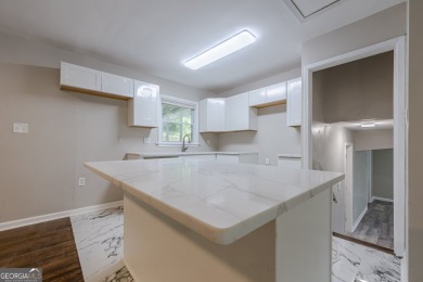 This home qualifies for up to $15,000 in grants-no income limits on Browns Mill Golf Course in Georgia - for sale on GolfHomes.com, golf home, golf lot