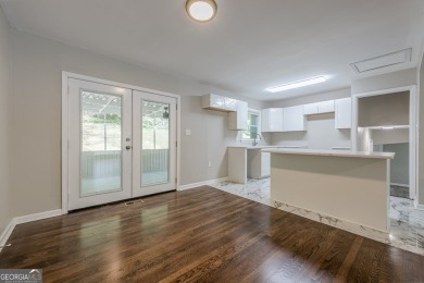 This home qualifies for up to $15,000 in grants-no income limits on Browns Mill Golf Course in Georgia - for sale on GolfHomes.com, golf home, golf lot