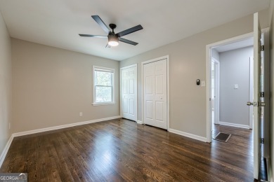 This home qualifies for up to $15,000 in grants-no income limits on Browns Mill Golf Course in Georgia - for sale on GolfHomes.com, golf home, golf lot