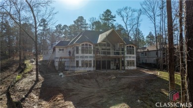 Introducing a New Construction luxurious custom home nestled in on Reynolds Lake Oconee - The Oconee in Georgia - for sale on GolfHomes.com, golf home, golf lot