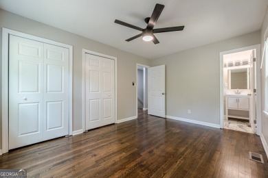 This home qualifies for up to $15,000 in grants-no income limits on Browns Mill Golf Course in Georgia - for sale on GolfHomes.com, golf home, golf lot