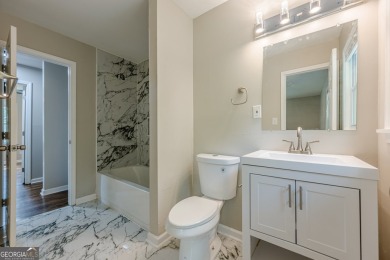 This home qualifies for up to $15,000 in grants-no income limits on Browns Mill Golf Course in Georgia - for sale on GolfHomes.com, golf home, golf lot