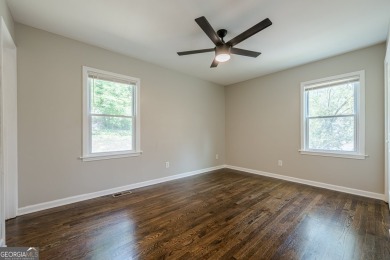 This home qualifies for up to $15,000 in grants-no income limits on Browns Mill Golf Course in Georgia - for sale on GolfHomes.com, golf home, golf lot