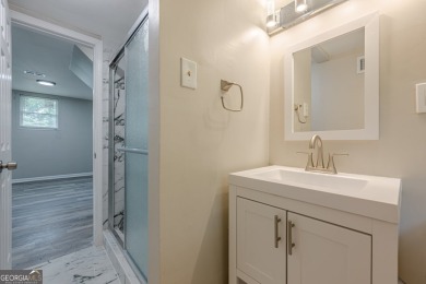 This home qualifies for up to $15,000 in grants-no income limits on Browns Mill Golf Course in Georgia - for sale on GolfHomes.com, golf home, golf lot