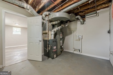 This home qualifies for up to $15,000 in grants-no income limits on Browns Mill Golf Course in Georgia - for sale on GolfHomes.com, golf home, golf lot
