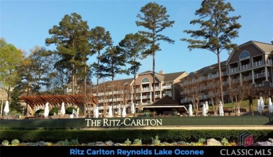 Introducing a New Construction luxurious custom home nestled in on Reynolds Lake Oconee - The Oconee in Georgia - for sale on GolfHomes.com, golf home, golf lot