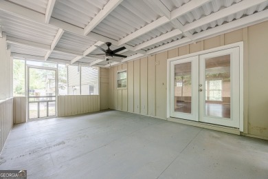 This home qualifies for up to $15,000 in grants-no income limits on Browns Mill Golf Course in Georgia - for sale on GolfHomes.com, golf home, golf lot