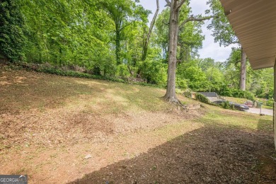This home qualifies for up to $15,000 in grants-no income limits on Browns Mill Golf Course in Georgia - for sale on GolfHomes.com, golf home, golf lot