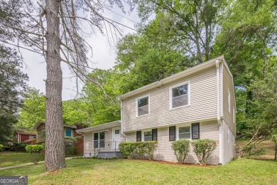 This home qualifies for up to $15,000 in grants-no income limits on Browns Mill Golf Course in Georgia - for sale on GolfHomes.com, golf home, golf lot