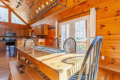 Charming Log Cabin Retreat in Bryson City -Nestled in the heart on Smoky Mountain Country Club in North Carolina - for sale on GolfHomes.com, golf home, golf lot