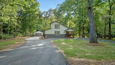 Completely remodeled inside and out, this 3-bedroom, 3-bath home on Tanglewood Shores Golf Club in Virginia - for sale on GolfHomes.com, golf home, golf lot
