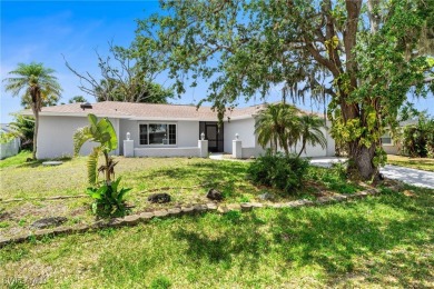 This stunning Renovated home IS STURDY AS STEEL AND NOTHING TO on Port Charlotte Golf Club in Florida - for sale on GolfHomes.com, golf home, golf lot