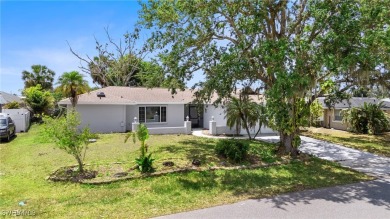 This stunning Renovated home IS STURDY AS STEEL AND NOTHING TO on Port Charlotte Golf Club in Florida - for sale on GolfHomes.com, golf home, golf lot