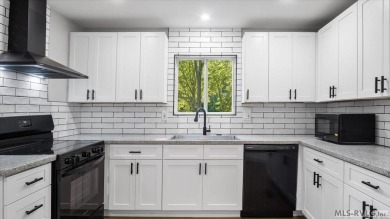 Completely remodeled inside and out, this 3-bedroom, 3-bath home on Tanglewood Shores Golf Club in Virginia - for sale on GolfHomes.com, golf home, golf lot