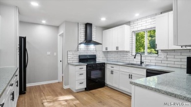 Completely remodeled inside and out, this 3-bedroom, 3-bath home on Tanglewood Shores Golf Club in Virginia - for sale on GolfHomes.com, golf home, golf lot
