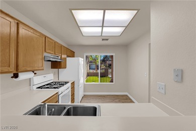 This beautiful Sun City Summerlin townhouse offers an elevated on Highland Falls Golf Club in Nevada - for sale on GolfHomes.com, golf home, golf lot