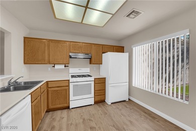 This beautiful Sun City Summerlin townhouse offers an elevated on Highland Falls Golf Club in Nevada - for sale on GolfHomes.com, golf home, golf lot