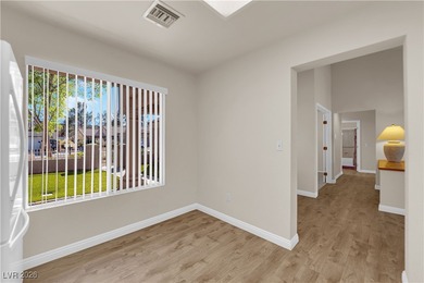 This beautiful Sun City Summerlin townhouse offers an elevated on Highland Falls Golf Club in Nevada - for sale on GolfHomes.com, golf home, golf lot