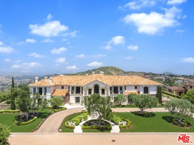 Impeccably renovated Mediterranean-style estate situated in the on Calabasas Golf and Country Club in California - for sale on GolfHomes.com, golf home, golf lot