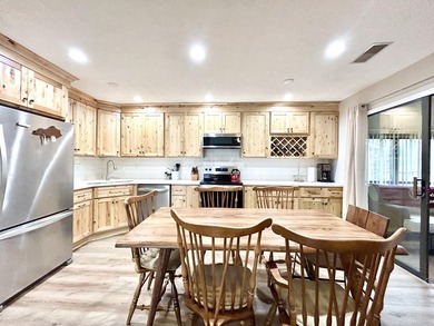 Upper level condo in a gated Lake Cumberland community. Condo on Woodson Bend Resort in Kentucky - for sale on GolfHomes.com, golf home, golf lot