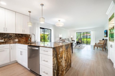 Experience effortless living in this light-filled first-floor on Boca Lago Golf and Country Club in Florida - for sale on GolfHomes.com, golf home, golf lot