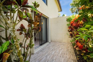 Experience effortless living in this light-filled first-floor on Boca Lago Golf and Country Club in Florida - for sale on GolfHomes.com, golf home, golf lot