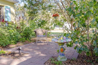 Welcome to Dunedin's Leafy Green Cottage! Nestled in the on The Dunedin Country Club in Florida - for sale on GolfHomes.com, golf home, golf lot