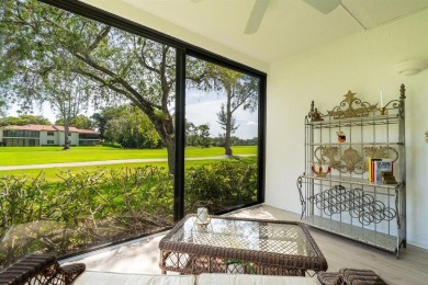 Experience effortless living in this light-filled first-floor on Boca Lago Golf and Country Club in Florida - for sale on GolfHomes.com, golf home, golf lot