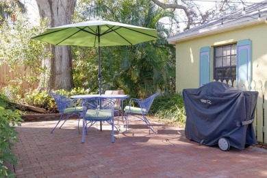 Welcome to Dunedin's Leafy Green Cottage! Nestled in the on The Dunedin Country Club in Florida - for sale on GolfHomes.com, golf home, golf lot