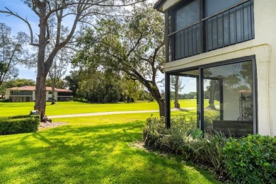 Experience effortless living in this light-filled first-floor on Boca Lago Golf and Country Club in Florida - for sale on GolfHomes.com, golf home, golf lot