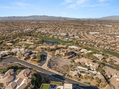 Perched on a 0.79-acre elevated lot in the prestigious MacDonald on Dragon Ridge Country Club in Nevada - for sale on GolfHomes.com, golf home, golf lot