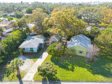 Welcome to Dunedin's Leafy Green Cottage! Nestled in the on The Dunedin Country Club in Florida - for sale on GolfHomes.com, golf home, golf lot