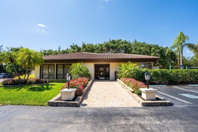 Experience effortless living in this light-filled first-floor on Boca Lago Golf and Country Club in Florida - for sale on GolfHomes.com, golf home, golf lot