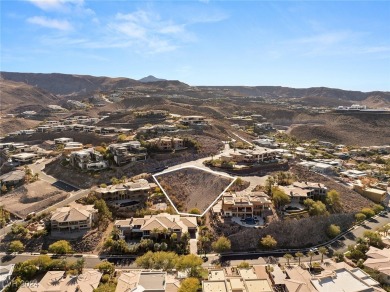 Perched on a 0.79-acre elevated lot in the prestigious MacDonald on Dragon Ridge Country Club in Nevada - for sale on GolfHomes.com, golf home, golf lot