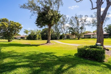 Experience effortless living in this light-filled first-floor on Boca Lago Golf and Country Club in Florida - for sale on GolfHomes.com, golf home, golf lot