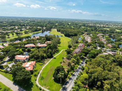 Experience effortless living in this light-filled first-floor on Boca Lago Golf and Country Club in Florida - for sale on GolfHomes.com, golf home, golf lot