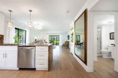 Experience effortless living in this light-filled first-floor on Boca Lago Golf and Country Club in Florida - for sale on GolfHomes.com, golf home, golf lot