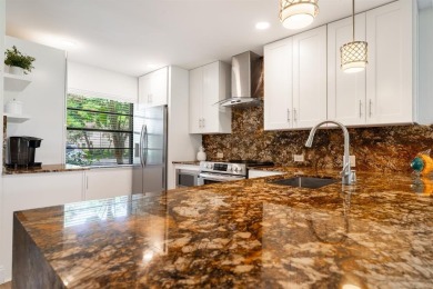 Experience effortless living in this light-filled first-floor on Boca Lago Golf and Country Club in Florida - for sale on GolfHomes.com, golf home, golf lot