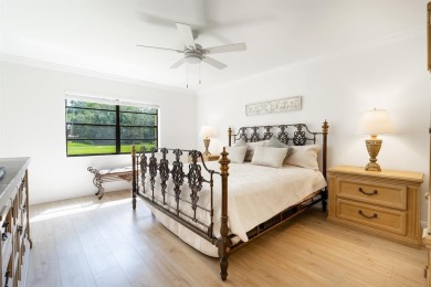 Experience effortless living in this light-filled first-floor on Boca Lago Golf and Country Club in Florida - for sale on GolfHomes.com, golf home, golf lot