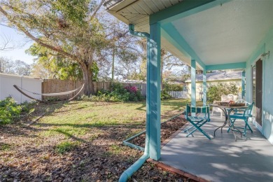 Welcome to Dunedin's Leafy Green Cottage! Nestled in the on The Dunedin Country Club in Florida - for sale on GolfHomes.com, golf home, golf lot