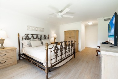 Experience effortless living in this light-filled first-floor on Boca Lago Golf and Country Club in Florida - for sale on GolfHomes.com, golf home, golf lot