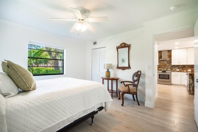 Experience effortless living in this light-filled first-floor on Boca Lago Golf and Country Club in Florida - for sale on GolfHomes.com, golf home, golf lot