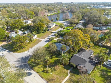 Welcome to Dunedin's Leafy Green Cottage! Nestled in the on The Dunedin Country Club in Florida - for sale on GolfHomes.com, golf home, golf lot