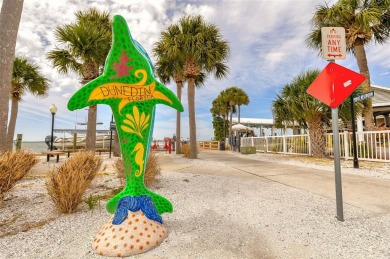 Welcome to Dunedin's Leafy Green Cottage! Nestled in the on The Dunedin Country Club in Florida - for sale on GolfHomes.com, golf home, golf lot