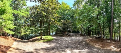 Experience ultimate privacy and breathtaking views from this on The Highlands Course at Lake Arrowhead in Georgia - for sale on GolfHomes.com, golf home, golf lot
