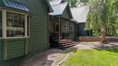 Experience ultimate privacy and breathtaking views from this on The Highlands Course at Lake Arrowhead in Georgia - for sale on GolfHomes.com, golf home, golf lot